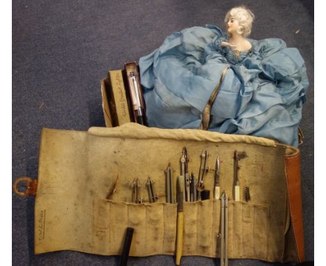 A 1920S 'LADY' TELEPHONE COVER with a wax head and bisque hands, a set of drawing instruments and a Vintage Ronson lighter/pe