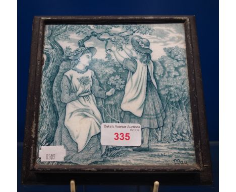 A VICTORIAN TILE with children, 'May' in a metal frame