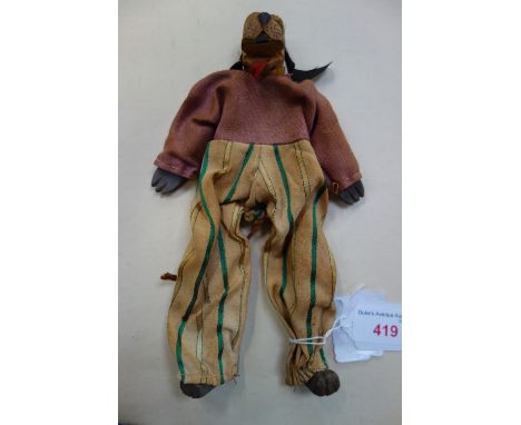 A VINTAGE 'GOOFY' with a carved wooden head, hands and feet, circa 1930s