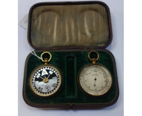 A BRASS CASED BAROMETER and a compass, both in a fitted case
