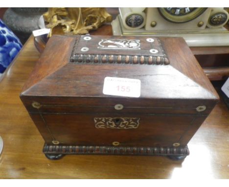 A 19TH CENTURY ROSEWOOD TEA CADDY of sarcophagus shape inlaid with mother-of-pearl