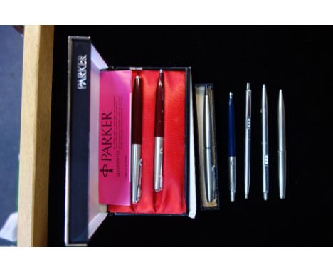 A VINTAGE PARKER PEN and others similar
