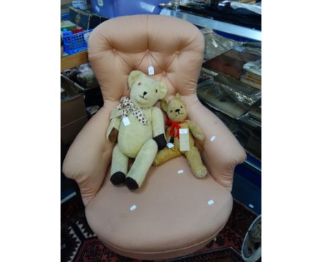 A VICTORIAN BUTTON BACK ARMCHAIR