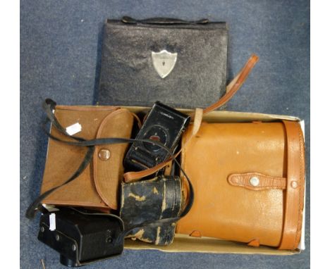 A VINTAGE BOX BROWNIE, similar cameras and binoculars