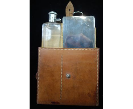 A SILVER PLATED HUNTING FLASK with lunch box, in a fitted leather outer case