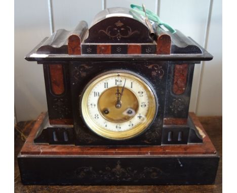 A VICTORIAN BLACK SLATE AND ROUGE MARBLE MANTEL CLOCK striking on a gong