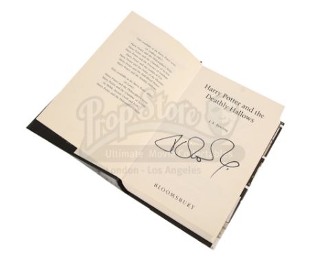 A J. K. Rowling-autographed copy of Harry Potter and The Deathly Hallows, the final book in her seven-part Harry Potter serie