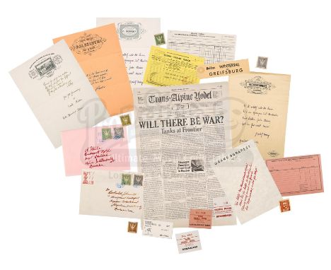 A newspaper, letters and a set of assorted postage slips from Wes Anderson's comedy The Grand Budapest Hotel. Zero (Tony Revo