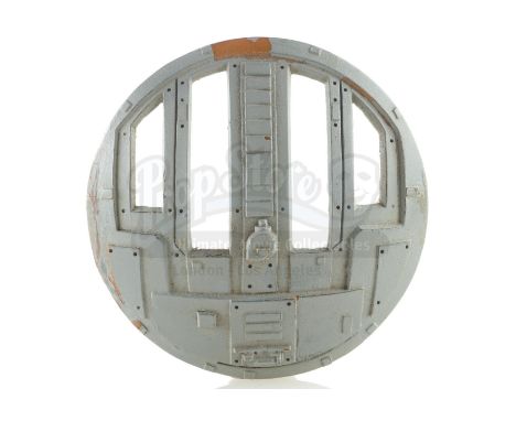 A TIE Fighter cockpit hatch model miniature casting from the production of George Lucas' Star Wars: A New Hope. TIE Fighters 