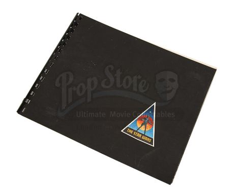 A cast and crew photo book dedicated to producer Robert Watts and signed by Gary Kurtz and George Lucas, from the production 