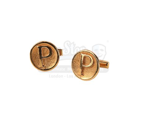 Austin Powers' (Mike Myers) cufflinks from Jay Roach's spy-comedy sequel Austin Powers: The Spy Who Shagged Me. Austin wore h