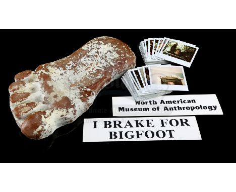 A set of museum gift shop props and continuity Polaroids from William Dear's family comedy Bigfoot and the Hendersons (releas