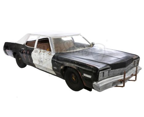 A Bluesmobile large-scale model miniature from John Landis' musical comedy The Blues Brothers. Elwood Blues (Dan Aykroyd) and