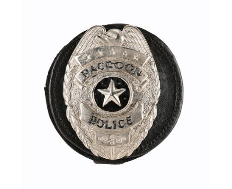 A Raccoon City Police badge from Alexander Witt's action-horror sequel Resident Evil: Apocalypse. Police detectives wore thei