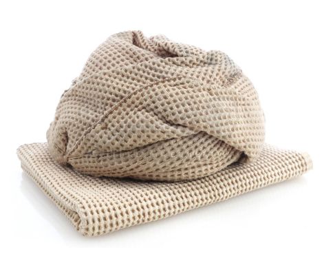 Douglas Quaid's (Arnold Schwarzenegger) turban from Paul Verhoeven's sci-fi action thriller Total Recall. After wrapping a to