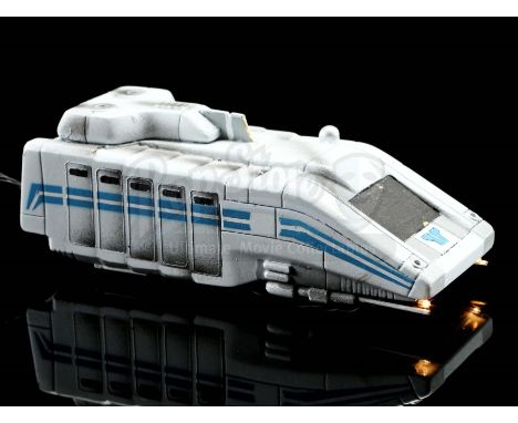 A StarSpeeder 3000 light-up model miniature from Disney's Star Wars: Star Tours. Riders of the motion-simulating theme-park a