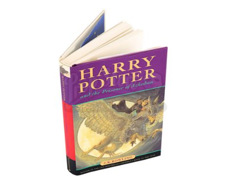 A copy of the novel Harry Potter and the Prisoner of Azkaban autographed by the three principal actors from the film adaptati