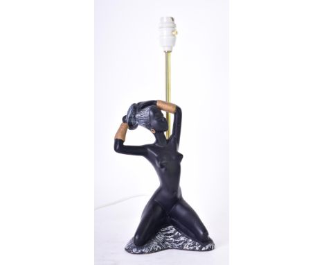 Manner of George Barsony - a vintage mid century studio pottery art lamp base. The light featuring a lady with gold bangles s