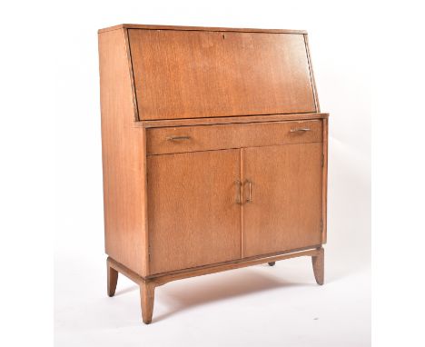 Lebus Link - A retro 20th century British design oak bureau writing table desk. The bureau having a fall front top section wi