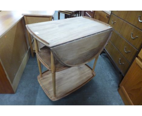 An Ercol elm and beech Windsor drop-leaf trolley 