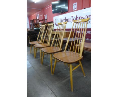 A set of four Ercol Blonde elm and beech Goldsmith chairs 