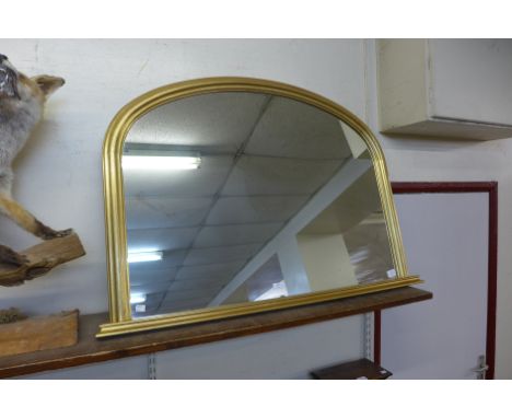 A large gilt overmantel mirror 