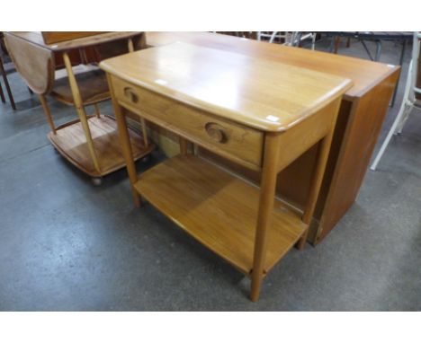 An Ercol Blonde ash single drawer side table 