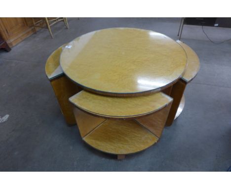 An Art Deco birds eye maple circular nest of tables 