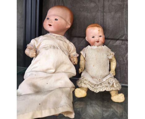 Armand Marseille 331 and 351 bisque head baby doll with sleeping blue eyes and jointed composition bodies, 20cm and 28cm. (2)