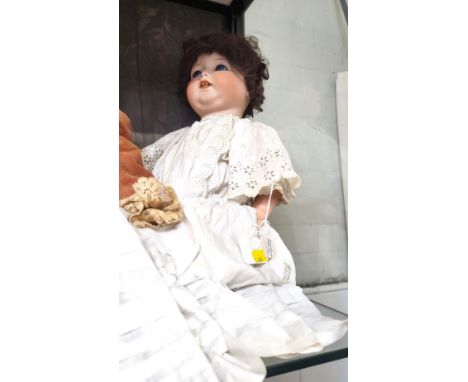 An Armand Marseille 996/12 bisque head doll impressed Koppelsdorf mark with sleeping blue eyes, open mouth, two teeth and fli
