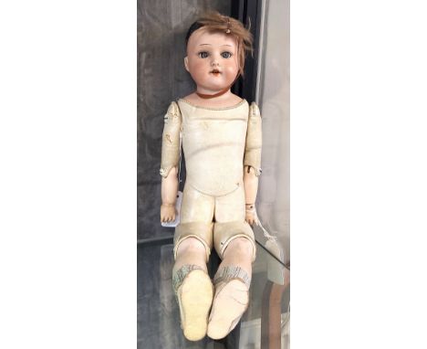 A Heubach 275. 15/0 bisque head doll with sleeping brown eyes, open mouth with two teeth and jointed cloth and plaster body, 