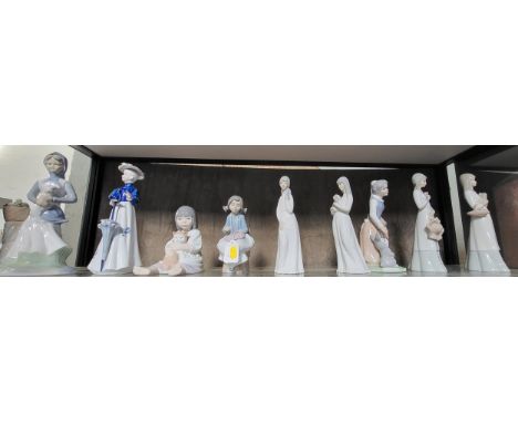 Nao seated girl with kitten, 15cm and seated girl, 17cm; six Spanish porcelain figures of girls including Porceval and Requen