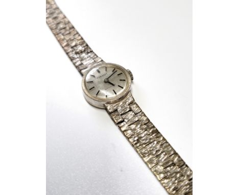 A ladies 'Tissot' stylist manual wind 1970's cocktail watch on an articulated frosted bracelet, dial 15mm. 
