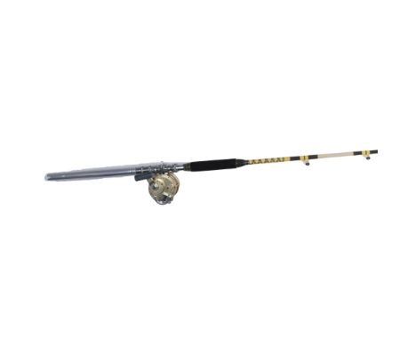 A stunning HRH (heavy roller handle) fiberglass bait casting rod, custom built by Tycoon Fin-Noir, with six eyelets and gimba