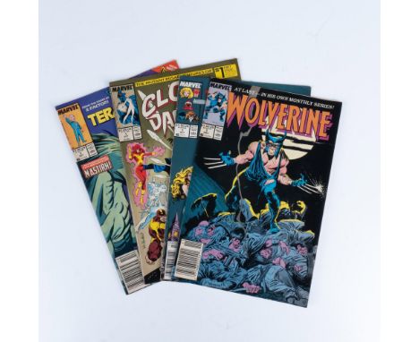 A set of 4 that includes Wolverine 1, Excalibur Volume 1 Number 1, The Mutant Misadventures of Cloak and Dagger Volume 1 Numb