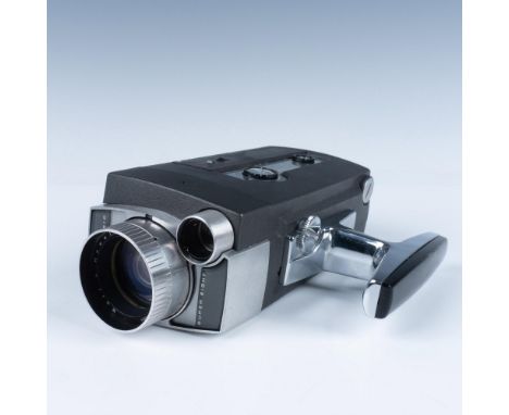 This sleek vintage retro film camera is designed for capturing high-quality home movies using Super 8 film, offering better i
