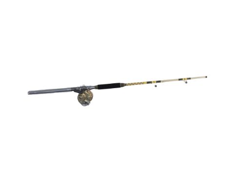 An exquisite HRH (heavy roller handle) fiberglass bait casting rod, custom built by Tycoon Fin-Noir, with six eyelets and gim