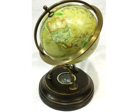 World globe on wooden base with compass, H: 25 cm. P&amp;P Group 2 (£18+VAT for the first lot and £3+VAT for subsequent lots)