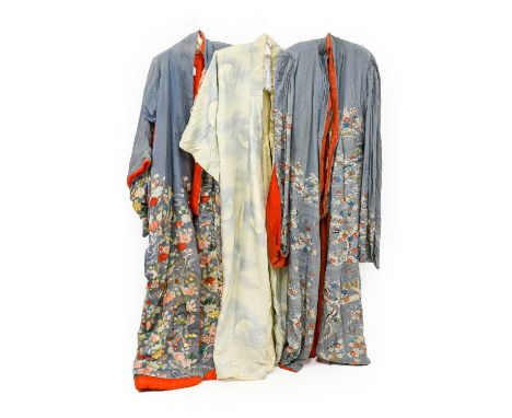 Early 20th Century Japanese Pale Blue Silk Kimono, embroidered to the lower part of the robe with coloured silks and gilt thr