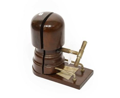 Late 19th Century Milliner's Hat Stretcher, with steel handle and size plaque, 16cm by 30cm by 32cm; and a Canvas Mounted Mil