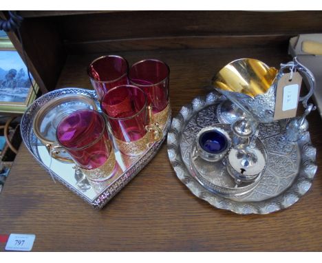 Heart shaped plated tray with pierced gallery together with 4 ruby glass drinking vessels, plated cruet, tray, and helmet sug