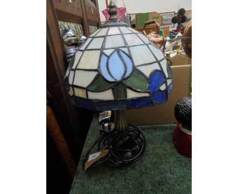 Modern brass table lamp with decorative Tiffany style coloured patterned domed shade