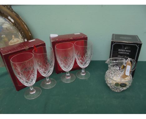 Unused Bohemian Crystal Glass cream jug and sugar basin together with 4 red crystal wine goblets all in their original boxes