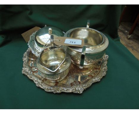 Plated butter dish, sugar basin and milk jug together with engraved circular plated tray