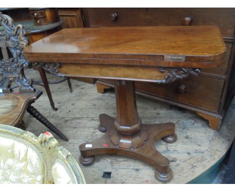 19th century burr walnut games table, the fold over swivel top revealing green baize playing area and storage compartment bel