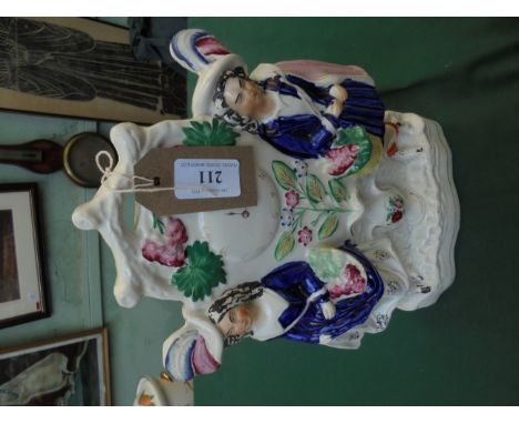 Victorian flatback clock figure of a couple in traditional dress