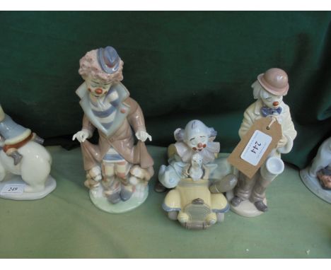 Lladro figure of two male clowns, one playing the saxophone the other Lladro privilege figure (No. 9031U) driving a car and a