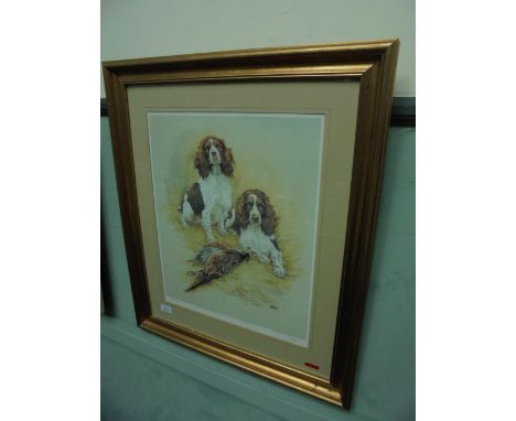 Gilt framed signed limited edition print of a pair of liver and white Spaniels beside their retrieved Cock Pheasant 