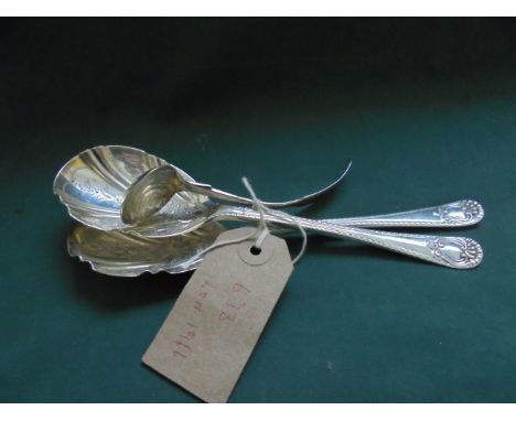 Pair of ornate silver scallop shaped salad spoons (London 1966)and a small Georgian silver ladle (London 1815)