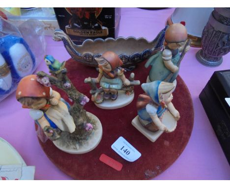 Wade Norseman sailing boat and 4 Hummel pieces of small child's ornaments 
